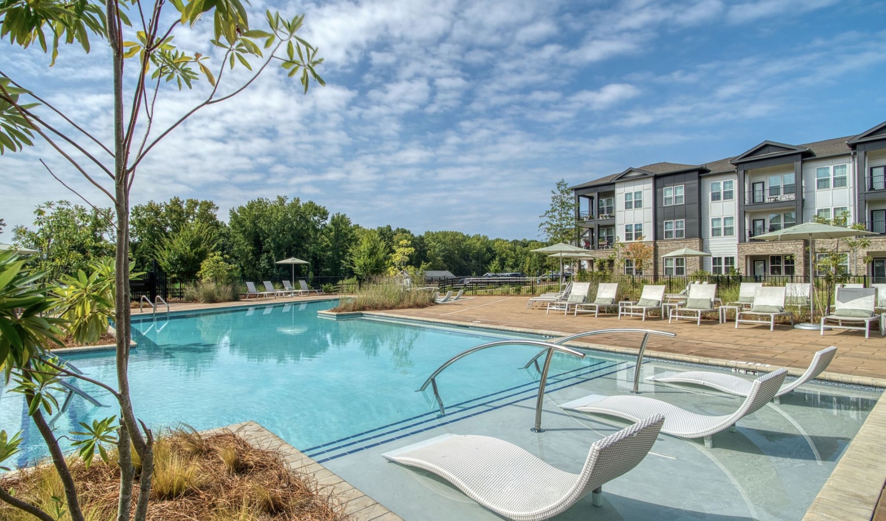 pool with lounge chairs